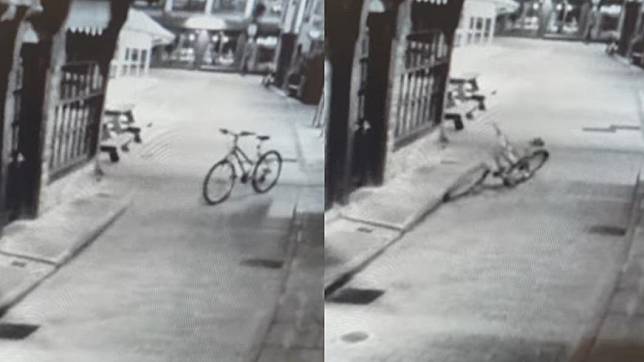 無人腳踏車緩慢行駛到路中間後倒下。（圖／翻攝自@Shambles Market York　Facebook）