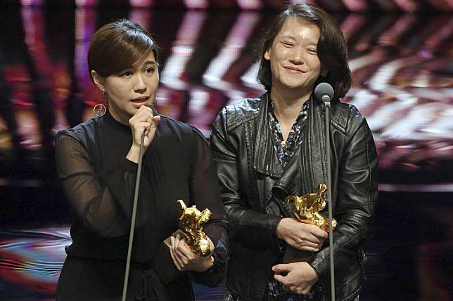 Taiwanese director Fu Yue (left) delivers a pro-independence speech at November’s Golden Horse Awards in Taipei as film producer Hong Ting Yi looks on. Photo: AP