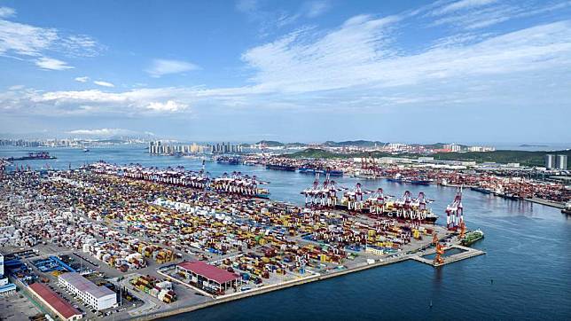 An aerial drone photo shows a view of Qianwan Port in Qingdao, east China's Shandong Province, Aug. 6, 2024. (Xinhua/Li Ziheng)