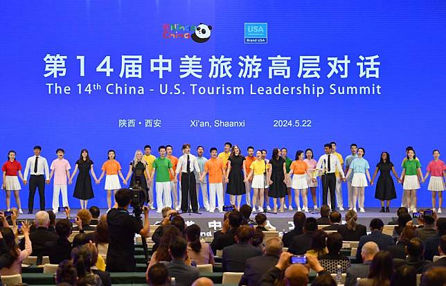 Chinese and Amercian students perform at the opening ceremony of the 14th China-U.S. Tourism Leadership Summit in Xi'an, northwest China's Shaanxi Province, May 22, 2024. (Xinhua/Shao Rui)