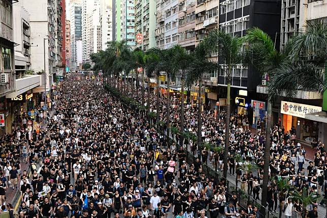 Crowds throng Wan Chai in a third massive march against the extradition bill. Photo: Warton Li