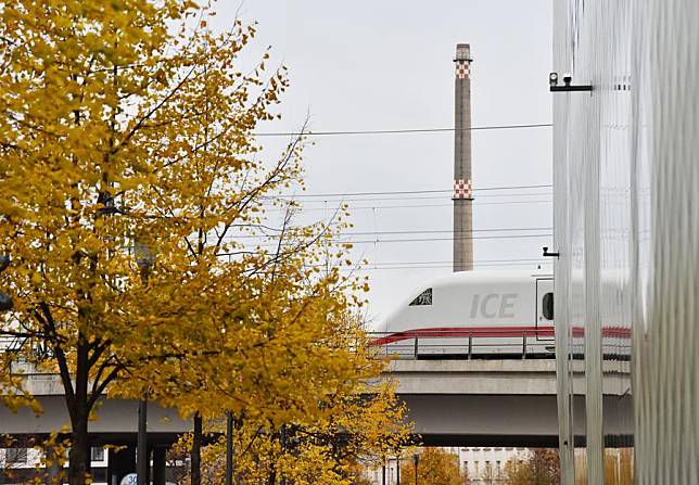 A train runs among autumn leaves in the urban area of Berlin, Germany, Nov. 2, 2023. (Xinhua/Ren Pengfei)