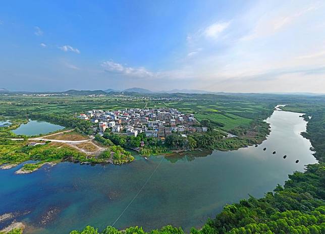 An aerial drone photo shows a view of Nalu Village in Xiangzhou County, south China's Guangxi Zhuang Autonomous Region, Oct. 9, 2024. (Xinhua/Zhou Hua)