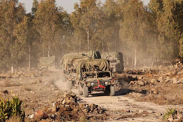 Israeli troops are seen at a village near the administrative border between the provinces of Daraa and Quneitra, Syria, on Dec. 17, 2024. (Photo by Gil Cohen Magen/Xinhua)