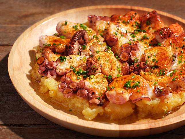 Octopus “a la gallega” on top of smoked potatoes