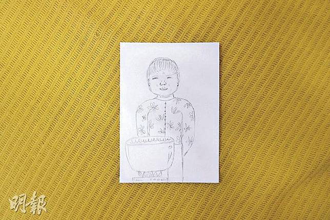 「迷你家譜」工作坊讓參加者先畫出自己心目中家人的形象，其中Jazz畫了祖母為一家人煮髮菜湯的畫面。（曾曉玲攝）