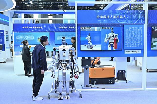 This photo taken on April 26, 2024 shows an emergency rescue humanoid robot on display at the Zhongguancun Exhibition Center in Beijing, capital of China. (Xinhua/Li Xin)