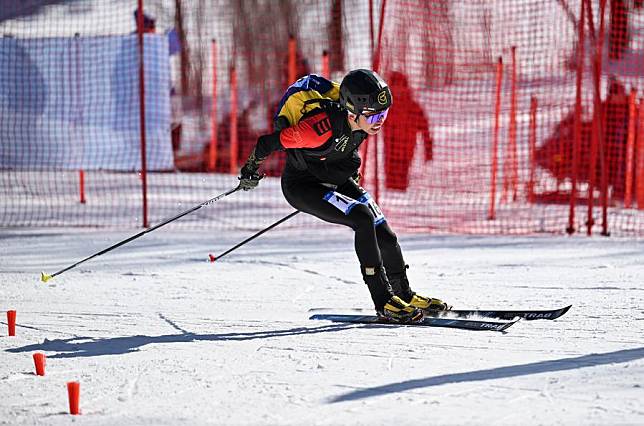 Buluer of China competes in the ski mountaineering men's sprint final at the 9th Asian Winter Games in Yabuli, northeast China's Heilongjiang Province, Feb. 9, 2025. (Xinhua/Xie Jianfei)