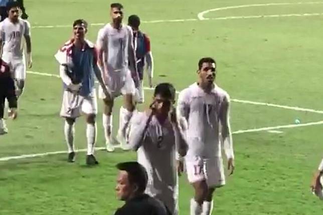 Bahrain player Sayed Baqer appears to make a racist gesture towards Hong Kong supporters following their World Cup qualifier. Photo: Twitter/@pjrydo