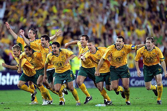 The Australian Socceroos celebrate after defeating Uruguay in the Fifa World Cup qualifying play-off at Stadium Australia in Sydney in November 2005. Photo: AFP