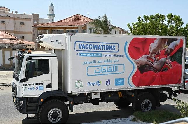 This photo taken on Oct. 5, 2024 shows a truck carrying cholera vaccine doses in Port Sudan, Sudan. (Sudanese Ministry of Health/Handout via Xinhua)