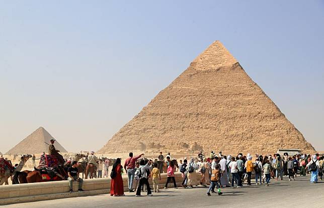 Tourists visit the Giza Pyramids scenic spot in Giza, Egypt, on Oct. 19, 2024. (Xinhua/Sui Xiankai)