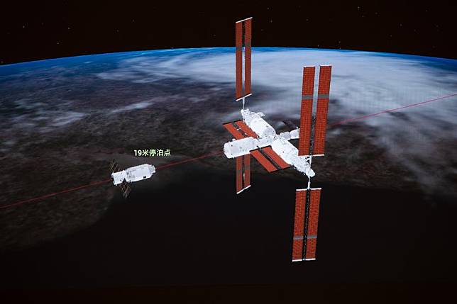 This simulated image captured at the Beijing Aerospace Control Center on Nov. 16, 2024 shows China's cargo spacecraft Tianzhou-8 docking with the orbiting Tiangong space station. (Photo by Han Qiyang/Xinhua)