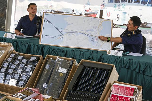 Pao Man-hon and Leung You-man, from Hong Kong customs, explain to the media how the city’s largest sea-smuggling bust of the year came about. Photo: Jonathan Wong