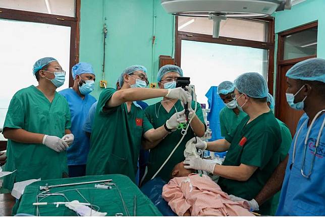 The 34th batch of the Chinese medical team in Tanzania's Zanzibar operates on a five-year-old boy using fiberoptic bronchoscopy to remove a foreign body in Zanzibar, Tanzania, on Oct. 22, 2024. (The 34th batch of the Chinese medical team in Tanzania's Zanzibar/Handout via Xinhua)