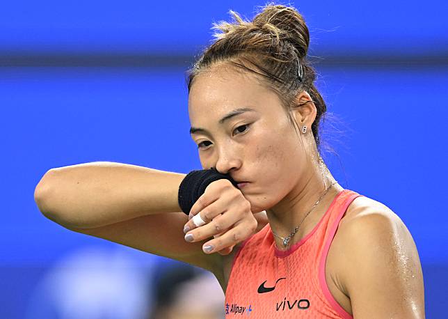 Zheng Qinwen reacts during the women's singles final match against Aryna Sabalenka of Belarus at the 2024 Wuhan Open tennis tournament in Wuhan, central China's Hubei Province, Oct. 13, 2024. (Xinhua/Cheng Min)