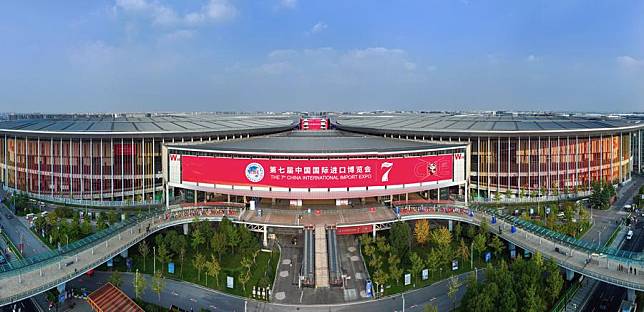 A panoramic drone photo taken on Nov. 2, 2024 shows the National Exhibition and Convention Center (Shanghai), the main venue for the 7th China International Import Expo (CIIE), in east China's Shanghai. (Xinhua/Liu Ying)