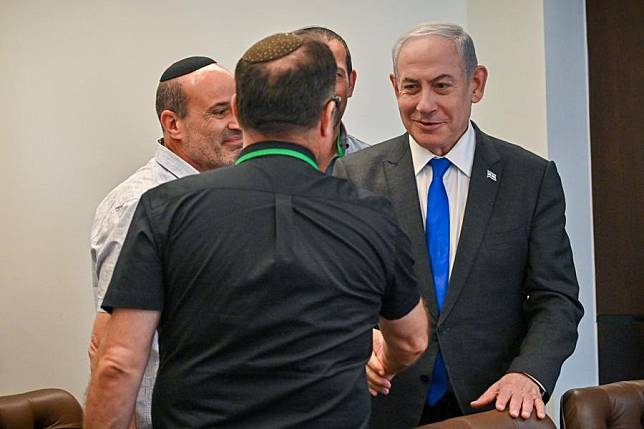 Israeli Prime Minister Benjamin Netanyahu meets with families of hostages at the Prime Minister's Office in Jerusalem, on April 30, 2024. Israeli Prime Minister Benjamin Netanyahu pledged on Tuesday to launch a ground attack on Rafah “with or without” a deal with Hamas. (Kobi Gideon/GPO/Handout via Xinhua)