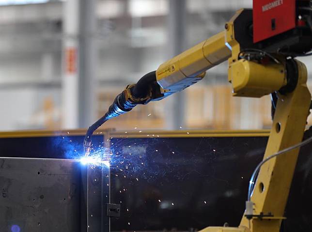 This photo taken on Nov. 29, 2024 shows a smart welding robot at a local company in Chenzhou City, central China's Hunan Province. (Xinhua/Wang Jingqiang)