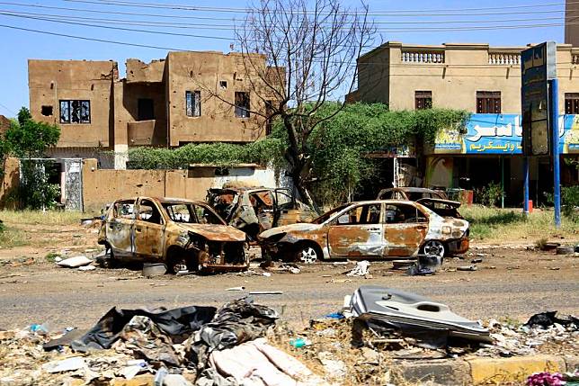 Photo taken on Oct. 28, 2024 shows destroyed vehicles in Bahri city, north of Khartoum, Sudan. The International Organization for Migration (IOM) said on Tuesday that more than 14 million people had fled their homes since the beginning of the ongoing conflict in Sudan. (Xinhua/Mohamed Khidir)