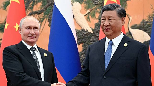 中國國家主席習近平去年10月18日在北京人民大會堂，與來訪的俄羅斯總統普丁舉行會談。路透社