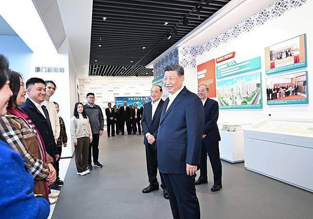 Chinese President Xi Jinping, also general secretary of the Communist Party of China Central Committee and chairman of the Central Military Commission, talks with Macao residents living in Hengqin during an inspection of the Guangdong-Macao In-Depth Cooperation Zone in Hengqin, located at the southern tip of Zhuhai in Guangdong Province, Dec. 19, 2024. Xi, accompanied by Ho Iat Seng, chief executive of the Macao Special Administrative Region (SAR), inspected the cooperation zone on Thursday. (Xinhua/Yan Yan)