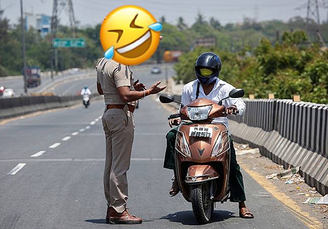▲印度警戴「冠狀病毒盔」籲防疫，誇張模樣笑翻網。（圖／翻攝自外媒）