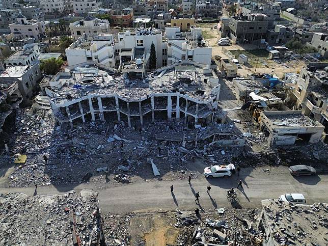 An aerial drone photo taken on Jan. 19, 2025 shows damaged houses after Israeli airstrikes in the southern Gaza Strip city of Rafah. A tense ceasefire agreement between Israel and Hamas took effect on Sunday, initiating six weeks of calm and raising hopes for an end to 15 months of Israeli assaults on Gaza that devastated the enclave and for the release of dozens of hostages held there. (Photo by Rizek Abdeljawad/Xinhua)