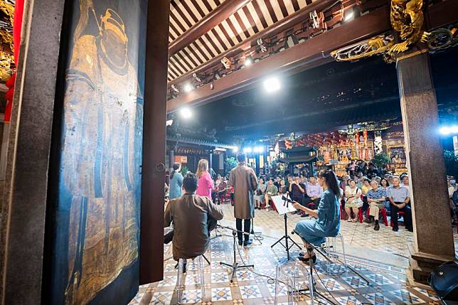 People enjoy a Nanyin concert performed by Siong Leng Musical Association at the Thian Hock Keng Temple, Singapore, Oct. 21, 2024. (Then Chih Wey/Xinhua)