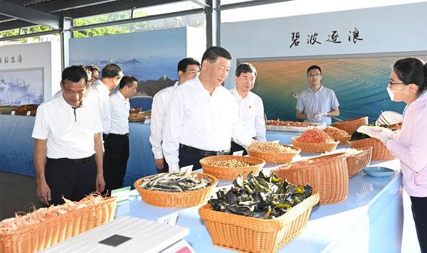 習近平赴福建考察時要求，促進兩岸文化交流，增進台灣同胞的民族認同、文化認同、國家認同。 圖：翻攝人民網