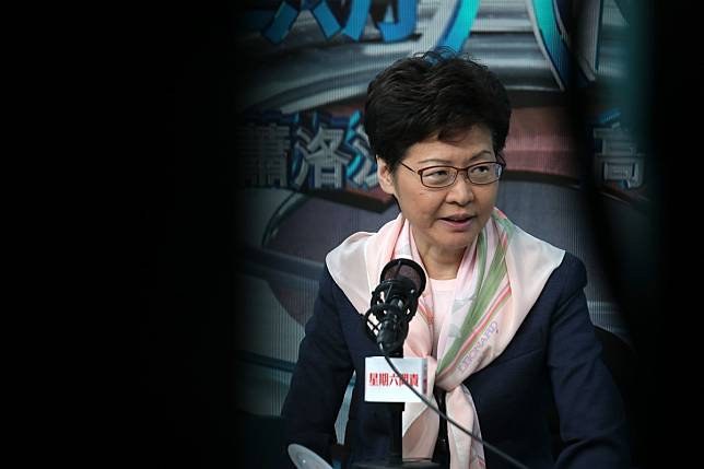 Carrie Lam has backed one of her advisers following conflict of interest concerns raised over property purchases made by his family. Photo: Xiaomei Chen