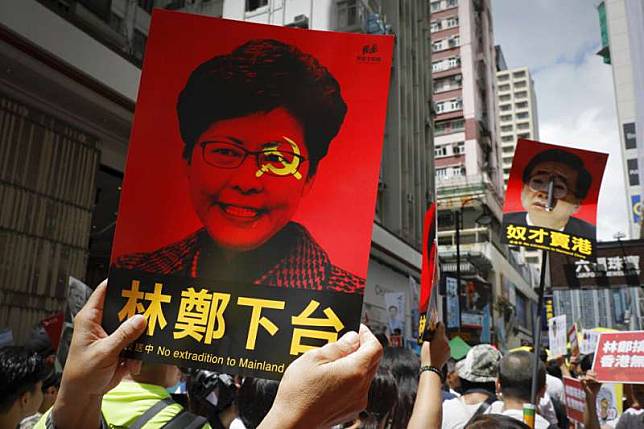 香港「民間人權陣線」9日發起反對修訂《逃犯條例》的反送中大遊行，宣布共有103萬人參與。（美聯社）