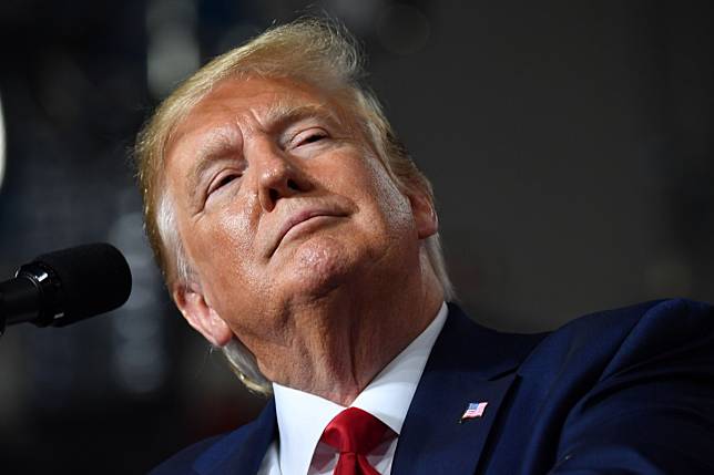 US President Donald Trump said on Friday that he was raising tariffs on Chinese goods again. Photo: AFP