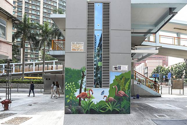 Riitta Kuisma, an artist from Finland, draws murals on Whampoa Street in Hung Hom and around Hong Kong. 11OCT19 SCMP / Roy Issa