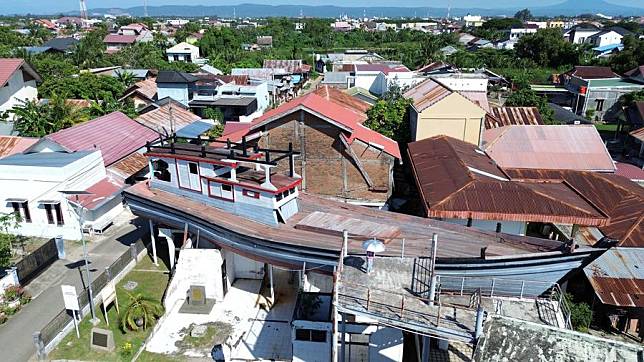 An aerial drone photo taken on Dec. 26, 2024 shows a boat washed ashore by the 2004 Indian Ocean tsunami in Aceh Province, Indonesia. (Photo by Fachrul Reza/Xinhua)