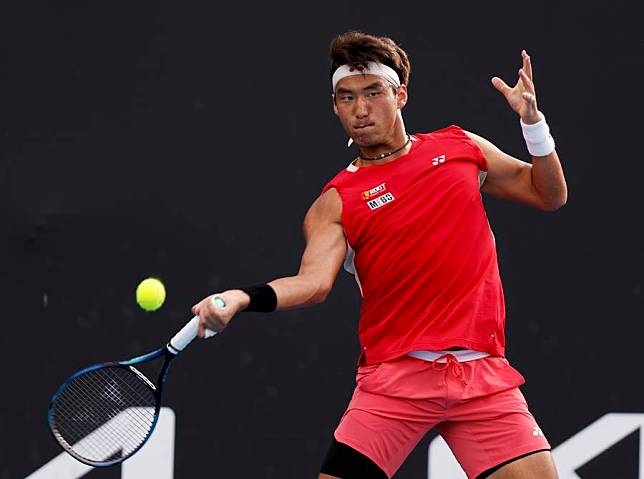 China's Buyunchaokete hits a return during the men's singles first-round match against Lebanon's Hady Habib at the 2025 Australian Open tennis tournament in Melbourne, Australia, on Jan. 12, 2025. (Xinhua/Ma Ping)