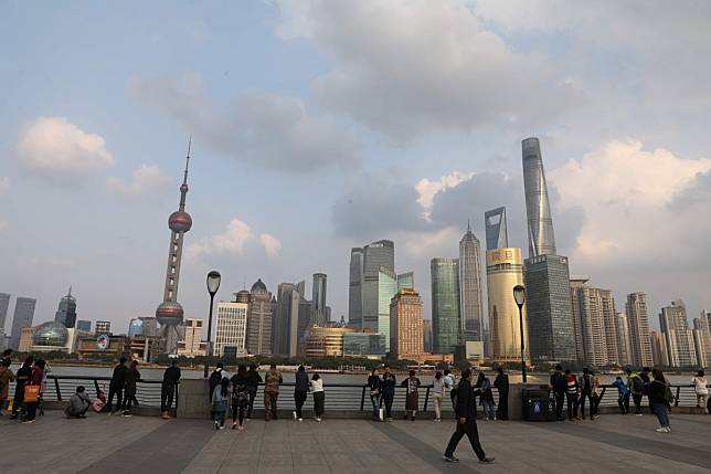 While Beijing remains the global capital of billionaires, the growing numbers in Shanghai has allowed the mainland financial hub to overtake Hong Kong for the first time this year, according to the Hurun Report Global Rich List. Photo: AFP