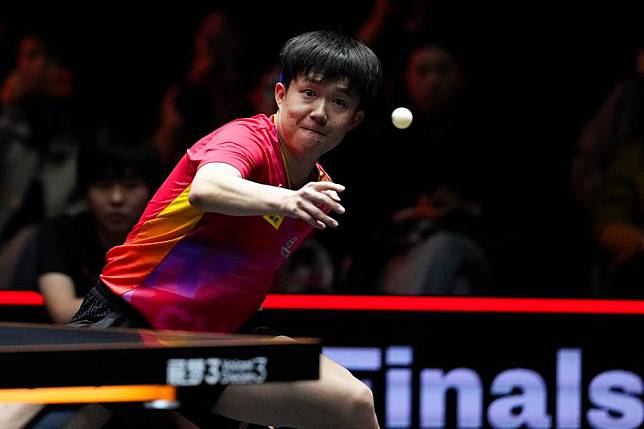 Wang Chuqin hits a return during the men's singles quarterfinal match against Truls Moregard of Sweden at World Table Tennis (WTT) Finals Fukuoka 2024 in Kitakyushu, Japan, on Nov. 22, 2024. (Xinhua/Zhang Xiaoyu)