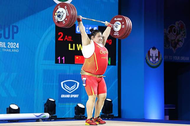 Li Wenwen of China in action in the women's +87kg category at the International Weightlifting Federation (IWF) World Cup in Phuket, Thailand on April 10, 2024. (Xinhua/Wang Teng)