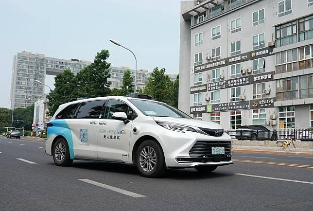 An autonomous vehicle undergoes road testing at an autonomous driving demonstration area in Yizhuang in Beijing, capital of China, June 19, 2024. (Xinhua/Zhang Chenlin)