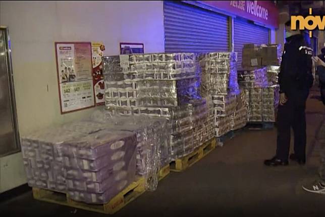 About 600 rolls of toilet paper were stolen from outside a supermarket in Mong Kok on Monday morning. Photo: Now TV