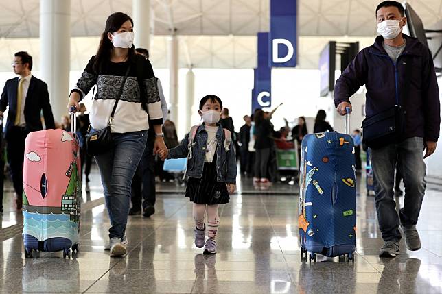 Cathay Pacific says it will allow passengers flying to or from any mainland China airport to rebook, re-route or take a refund on any type of ticket booked up to the end of February. Photo: Bloomberg