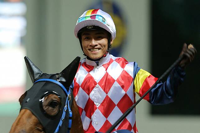 Jockey Keith Yeung is all smiles after recording his 250th Hong Kong winner. Photos: Kenneth Chan