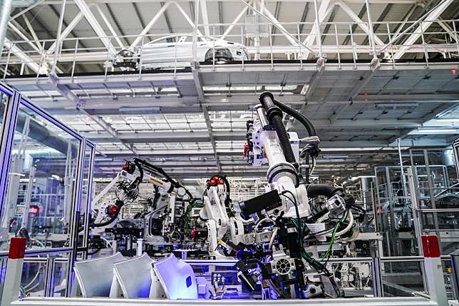 This photo taken on March 25, 2024 shows assembly lines at a plant of Xiaomi in Beijing, capital of China. Chinese tech firm Xiaomi on Thursday night released its first self-developed new energy vehicle model SU7. (Xinhua/Peng Ziyang)