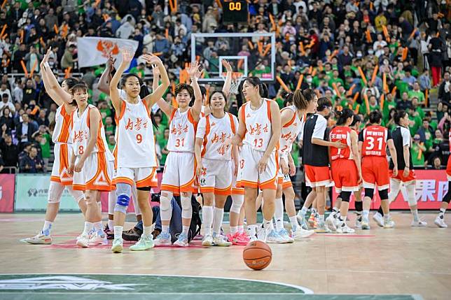 Inner Mongolia players celebrate their win against Sichuan in Game 2 of the Women's Chinese Basketball Association (WCBA) league Finals in Hohhot, north China's Inner Mongolia Autonomous Region on April 13, 2024. (Xinhua/Lian Zhen)