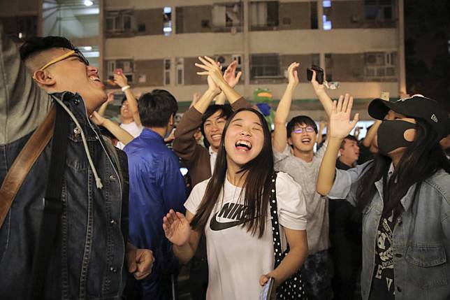 Pro-democracy supporters celebrate as the results come in for last November’s district council elections. Photo: AP