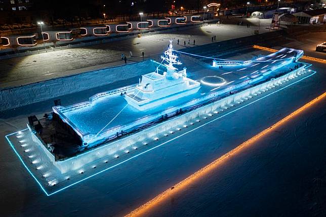 A drone photo shows an ice sculpture inspired by the Chinese aircraft carrier Liaoning on display in Daowai District of Harbin City, northeast China's Heilongjiang Province, Jan. 7, 2025. (Xinhua/Xie Jianfei)