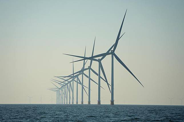 Offshore wind turbines are pictured in the waters of Laizhou City, east China's Shandong Province, Jan. 7, 2025. (Xinhua/Xu Suhui)