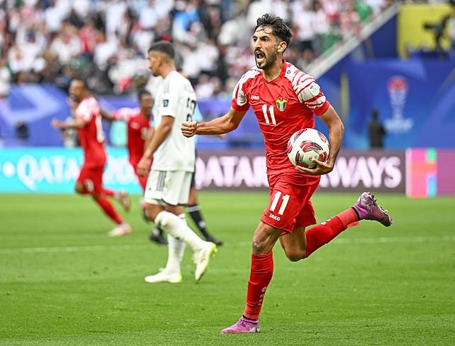 Jordan's Yazan Alnaimat celebrates scoring during the round of 16 match between Iraq and Jordan at AFC Asian Cup Qatar 2023 in Doha, Qatar, Jan. 29, 2024. (Xinhua/Sun Fanyue)