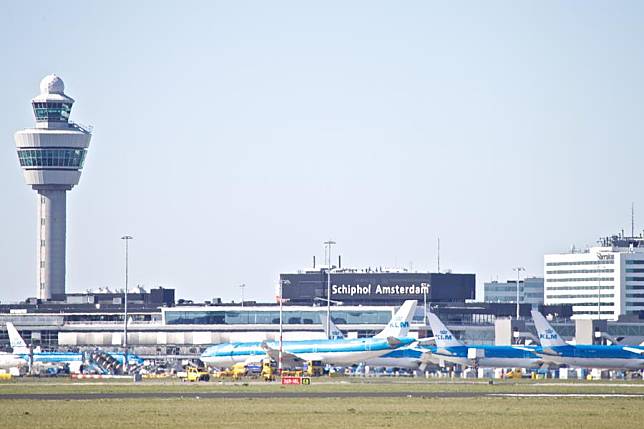 Airplanes of the Dutch airline KLM are parked at Schiphol airport in Amsterdam, the Netherlands, March 31, 2020. (Photo by Sylvia Lederer/Xinhua)